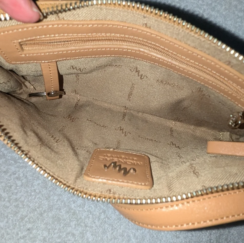 Monsac tan leather bag.
